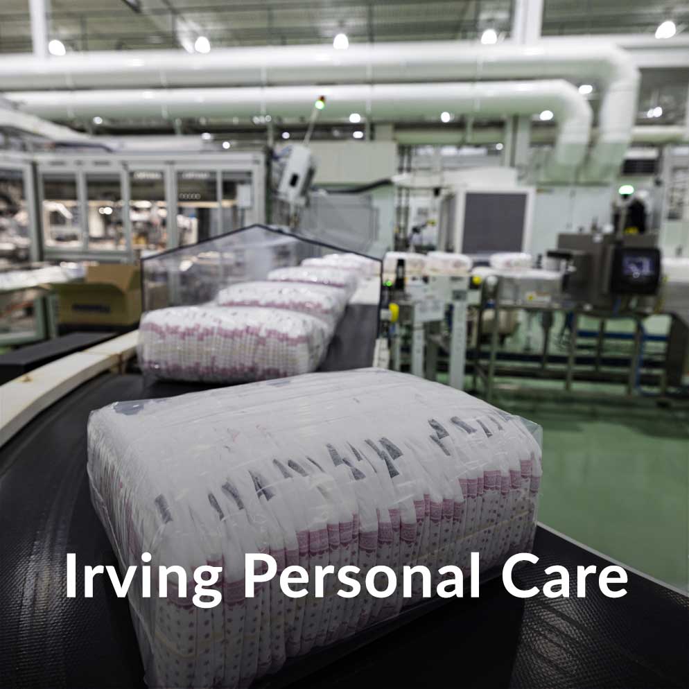 Personal care products being packaged on a conveyer belt
